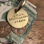 1964 Studebaker Avanti Brass Key Fob New. Price: $14.95.