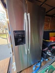 Amana Stainless Steel Refrigerator With Ice & Water On Door. Used. Price: $500.00.