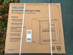 Newair Can Beverage Mini Fridge With Glass Door AB-600B. Price: $150.00.