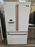 Cafe CYE22TP4MW2 36" Matte White Cd French Door Refrigerator Nob #160444 Open. Price: $2699.00.