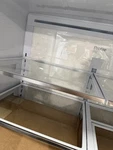 Glass Shelves Profile French Door Bottom Freezer Refrigerator PJE23BBYWBFS Open. Price: $30.00.