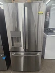 GFE24JYKFS 33" Stainless 23.6 Cu. Ft. French Door Refrigerator Nob #158242 Open. Price: $1999.00.