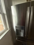 Refrigerator Model PFE28KYNKFS Left Door Replacement Open. Price: $300.00.
