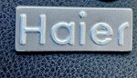 Haier Appliances Nameplate / Logo Emblem From Refrigerator Mdl# HA10TG21SS Open. Price: $29.00.