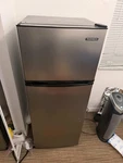 Thomson Silver Black Freestanding Top-freezer Refrigerator Reversible Door Used. Price: $100.00.