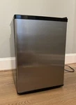 2.4 Cu. Ft. Refrigerator With Freezer, Adjustable Temperature, Stainless Steel Used. Price: $95.00.