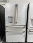 Cafe CXE22DP4PW2 36" Matte White Cd French Door Refrigerator Open. Price: $2299.00.