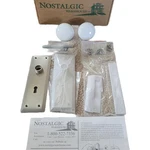 Nostalgic Warehouse New York Plate Keyhole Satin Nickel White Porcelain Knob Open. Price: $99.00.