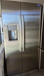 Side-by-side Counter Depth Refrigerator PZS22MYKFHFS Stainless Steel 21.8 Cu New. Price: $1200.00.