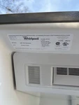 Whirlpool WRF767SDHZ02 Left Stainless Refrigerator Door Panel Used. Price: $125.00.