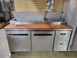 Used Arctic Air APP71R 71" Two Door Pizza Prep Refrigerator. Price: $1495.00.