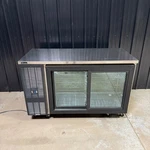 Perlick SDPS60 60" Black Pass-thru Sliding Door Back Bar Refrigerator Used. Price: $1349.95.