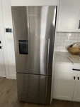 Fisher Paykel RF135BDLUX4N 25" Stainless Cd Bottom-freezer Refrigerator Open. Price: $1750.00.