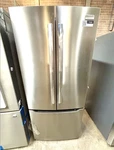 Frigidaire GRFN2023AF 20.0 Cu. Ft. French Door Standard-depth Refrigerator Open. Price: $1899.99.